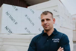 Unilin Insulation worker on site at factory