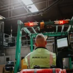 Man in forklift in Unilin Insulation Factory
