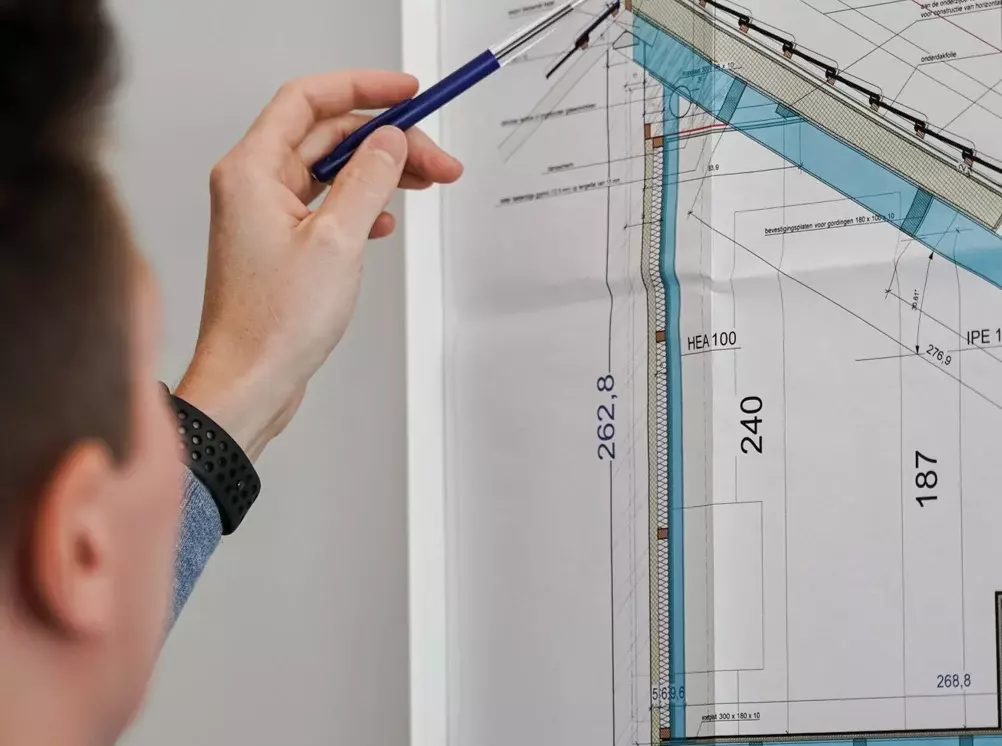 Graph being inspected by technical team at unilin insulation