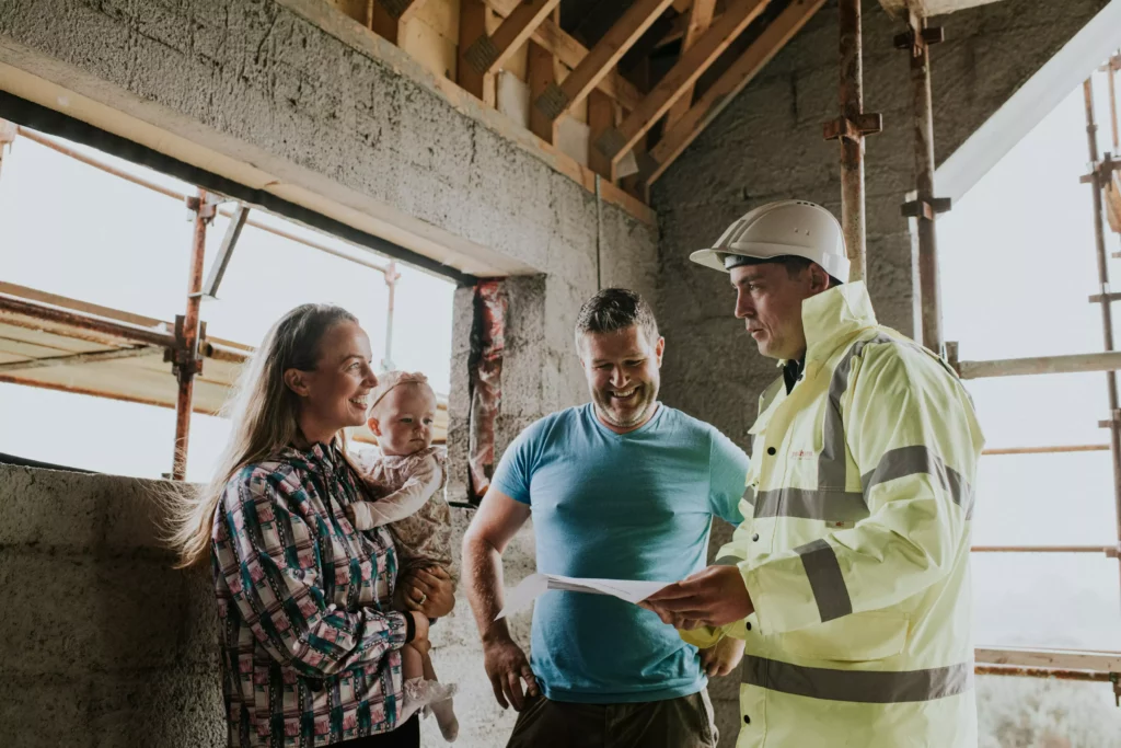 Unilin Insulation Technical team on site discussing u values and thermal bridging
